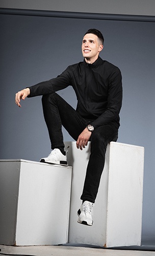 Man Posing in a Black Sweatshirt and Pant - Actor Headshots by Headshot Photographer in Minneapolis - Steffen Sharikov