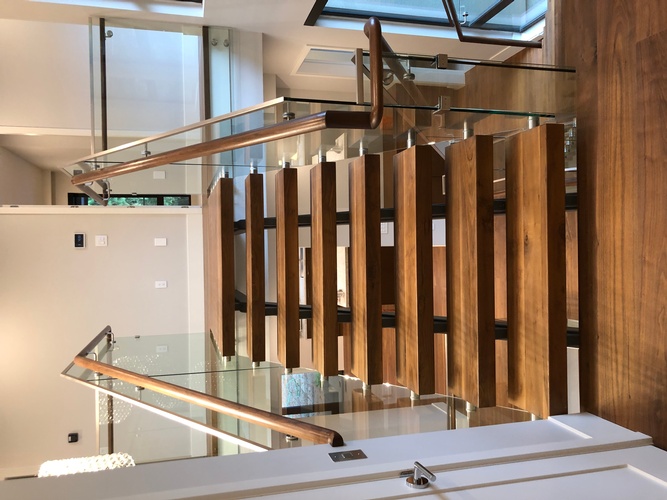 Modern Wooden Staircase by TJL Floor And Garage Door Inc - Flooring Contractor Burnaby 