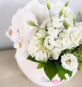 White flowers in baby basket - Wedding Florist in Brossard - YnV Lifestyle Inc.