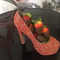 Chocolate shoe and strawberries