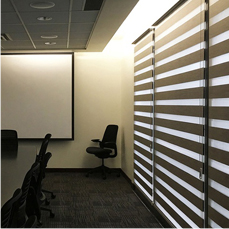 Window coverings installed by Winco Blinds & Window Fashion for an office conference room