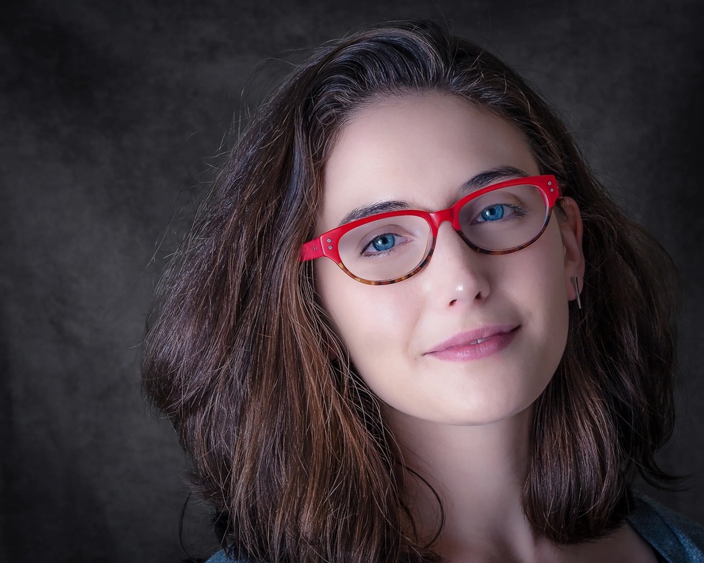 Young Lady wearing eyeglasses captured by Headshot Photographer NJ - Phillip Angelo