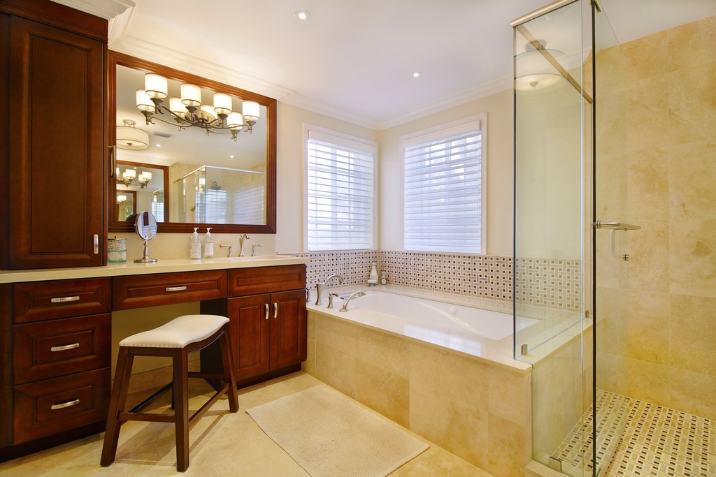Stylish Bathroom Design with Bathtubs and Cabinets by Andrea Duran Interiors - Bathroom Remodeling Firm in Davie, FL