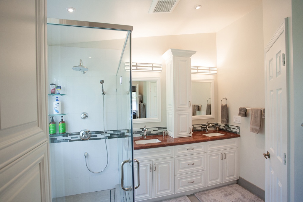 Simple Bathroom Design with Cabinets by Andrea Duran Interiors - Bathroom Remodeling Firm in Davie, FL