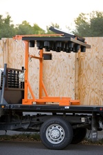Side View of Portable Folding Frame Arrow Board on Car - Transportation Solutions and Lighting, Inc