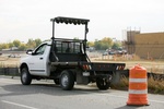 Side View of Portable Truck Mounted Arrow Boards on Roads - Transportation Solutions and Lighting, Inc