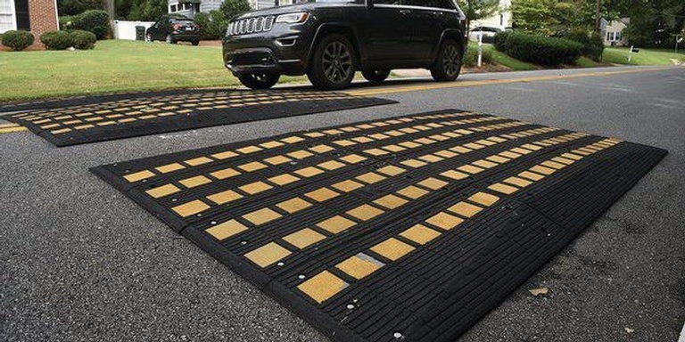Speed Cushions on Highways - Rubber Traffic Calming - Transportation Solutions and Lighting, Inc