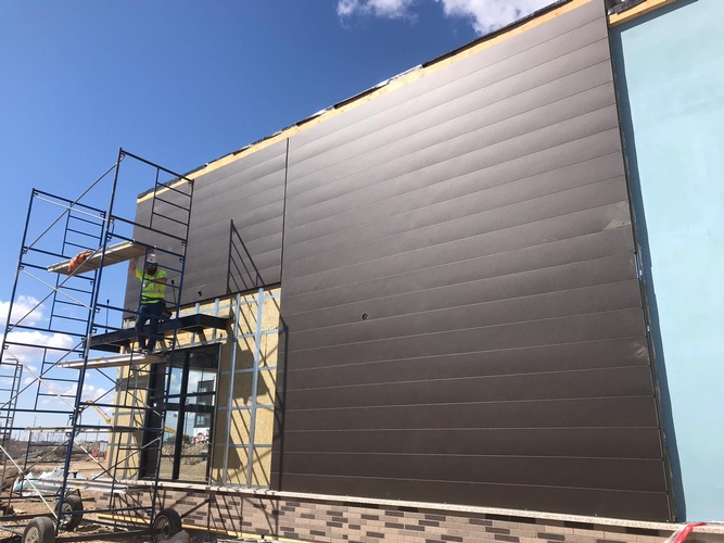 Commercial Retail Unit by Temple Metal Roofs Ltd - Manitoba Siding Company