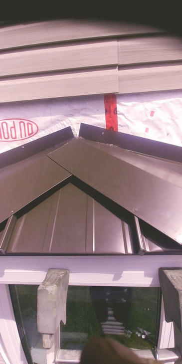 Bay Window Re-roof by Manitoba Metal Roofing Company - Temple Metal Roofs Ltd