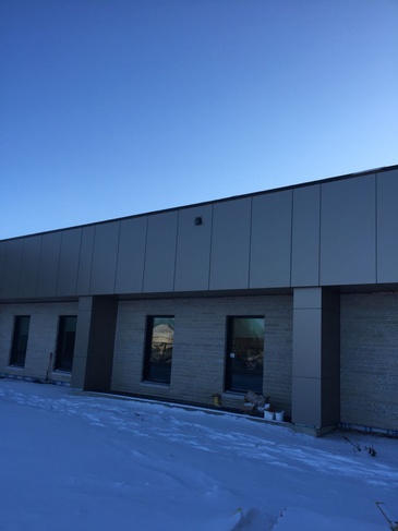 Dauphin School Roofing Services by Manitoba Metal Siding Company - Temple Metal Roofs Ltd