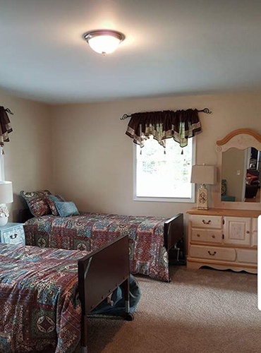 Two Single Beds at Senior Home Care Facilities Macomb County - Our Place Senior Assisted Living