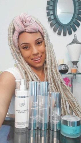 Satisfied Customer Showcasing Skin Care Products Purchased from Best Luxury Skin Care Brand Laur Skin Solutions™
