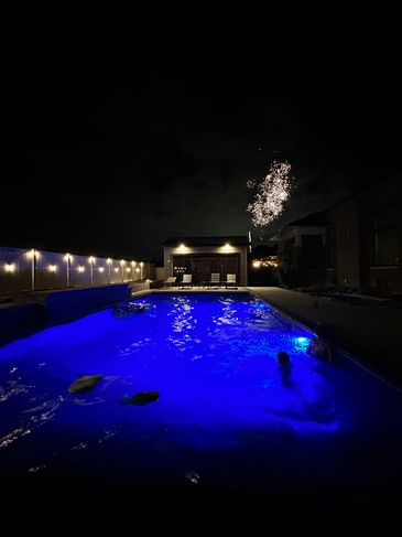 night time poolhouse