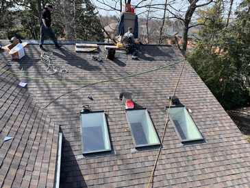 High-Quality Rubber Roofing Shingles installed for residential property by Imperial Roofs and Aluminum