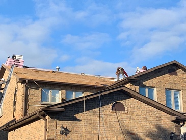 Professional Roofers at Imperial Roofs and Aluminum repair roofs of residential property