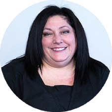 Liana assists patients with a warm smile as the receptionist at Perlmutter Dentistry in Toronto