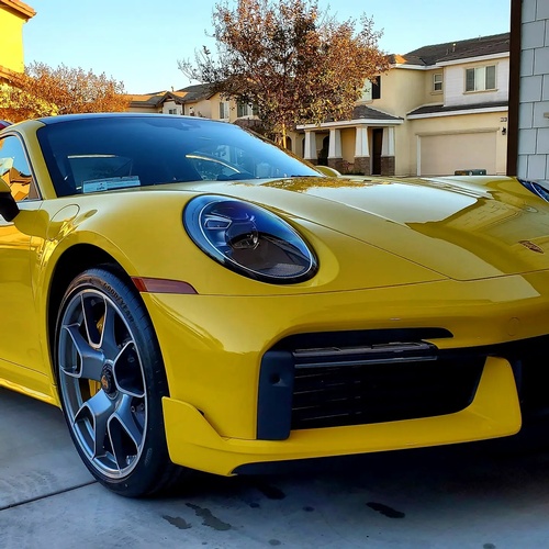 Ceramic Coating completed for yellow Porsche 911 by professionals of Car Passion Detailing