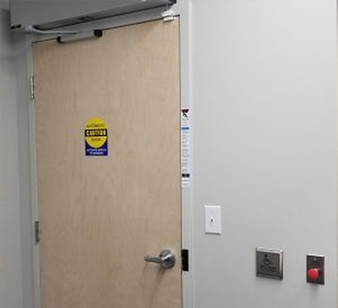 Automatic door closer system installed in the bathroom by Integral Konnect