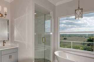 Custom Home build with High-End Bathroom by Home Builders of Newberry