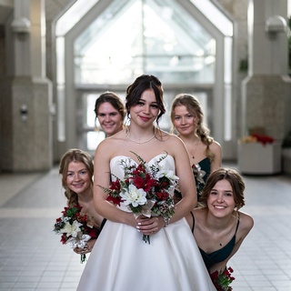 Photo of the bride with her beautiful bridesmaids captured by Darkstrand Visuals