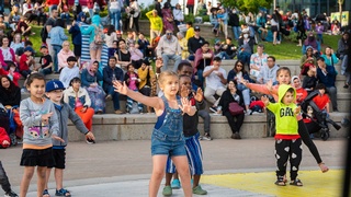 Picture of children dancing during the Canada 150 event captured by Darkstrand Visuals
