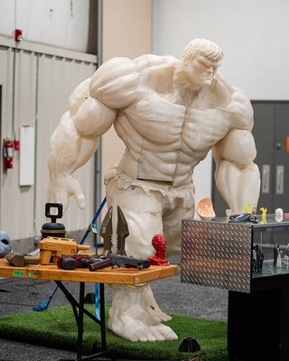 Darkstrand Visuals' photo of a 3D-printed hulk on exhibit at an event