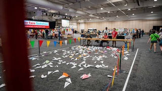 Children playing the paper rocket game and having fun at the event picture captured by Darkstrand Visuals