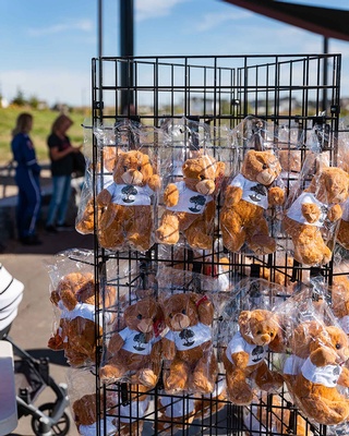 Packs of small teddy bear kept for sale during an event photo taken by Darkstrand Visuals