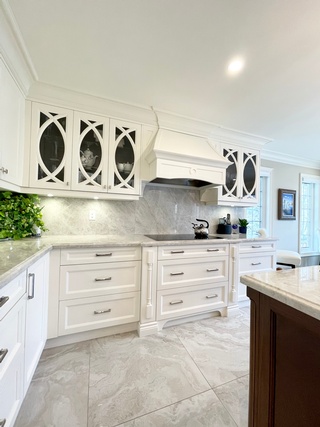 Furnished white Kitchen Renovation in Burlington by Concept Build Group