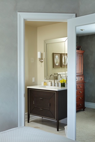 An elegant and classic wall mirror added as part of Concept Build Group's modern bathroom renovation