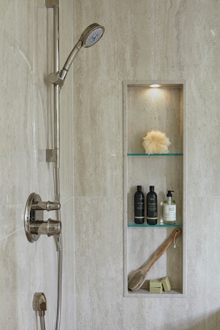 Adding a hand shower to the contemporary bathroom remodeling by Concept Build Group