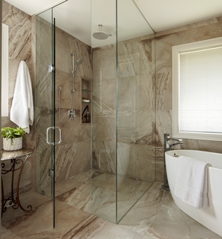 Bathroom improvement with Glass Shower Partition with luxurious bathtub by Concept Build Group