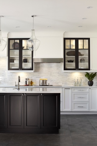 Concept Build Group's modern kitchen remodeling project includes necessary storage spaces.