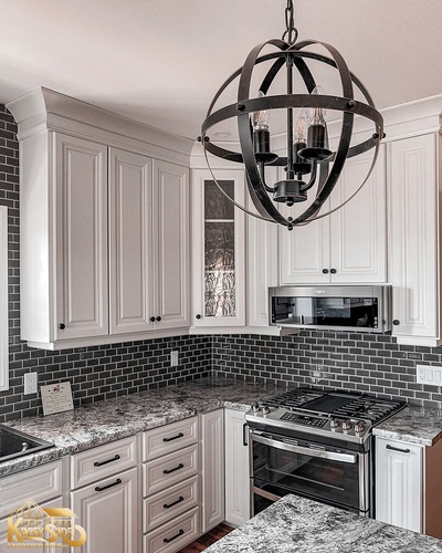 Kitchen Renovation Services with Gravitate Globe Chandelier done by Kreekside Construction Group Inc.