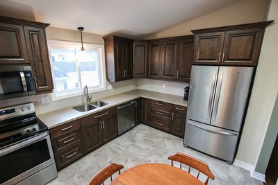 Kitchen Renovation with Wooden Cabinets done by Kreekside Construction Group Inc.
