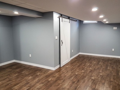 Wooden Flooring Basement Renovation Services by Kreekside Construction Group Inc. in Caledonia