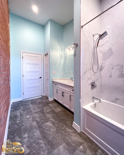 Bathroom Renovation Services with attached bath tub by Kreekside Construction Group Inc.