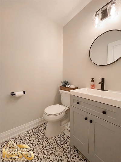 Bathroom Renovation Services with printed flooring by Kreekside Construction Group Inc.