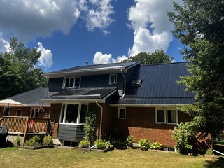 Home installed with high-quality roofing solution in Trenton by Parkhurst General Contracting