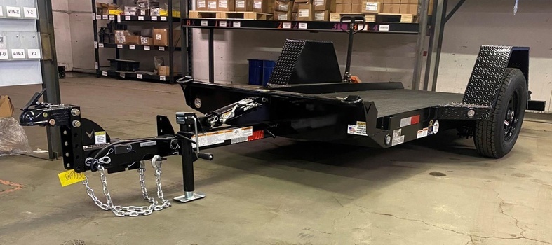 High-Quality Utility Tilt Deck Trailer with adjustable Coupler for sale at Pacific Rim Trailer Sales in British Columbia
