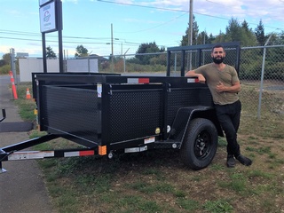 Happy Owner of Mini Dump Trailers purchased from Pacific Rim Trailer Sales