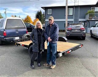 Ecstatic Customers of Pacific Rim Trailer Sales with Utility Flat Deck Trailers