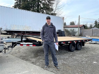 Delighted clients with a Deck Over Trailer from Pacific Rim Trailer Sales