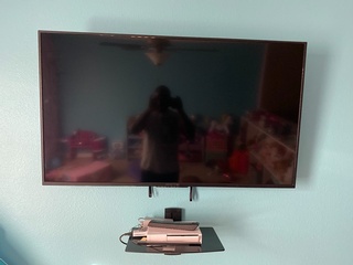 TV Mounting done according to client's specific space and preferences by TecDivine Business Solutions LLC