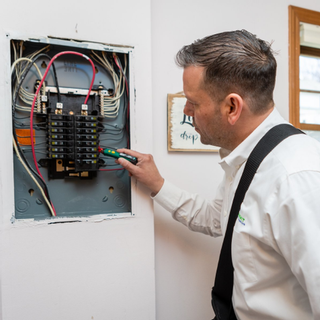 Expert Home Inspectors inspecting the Electrical System of a residential property