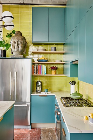 Modern kitchen interior design in Reynoldstown featuring a harmonious blue and yellow palette