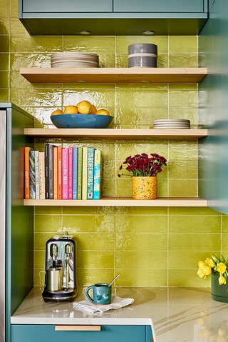 Artfully crafted Reynoldstown kitchen with exquisite blue and yellow accents by professional interior designer Atlanta