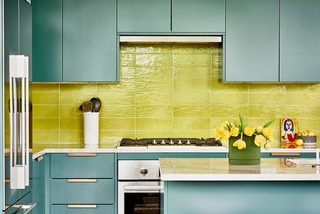 Inspiring Reynoldstown kitchen interior with a vibrant blue and yellow color scheme done by an interior designer in Atlanta