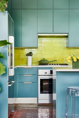 Elegant blue and yellow kitchen design in Reynoldstown by Beauty Is Abundant