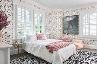 Elegant black and white spotted wallpaper bedroom design in Virginia Highlands by expert interior designers
